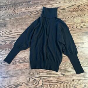 Black cut out back loose cashmere Lily McNeal turtleneck sweater